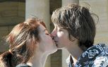 Students stage kiss-in for reforms